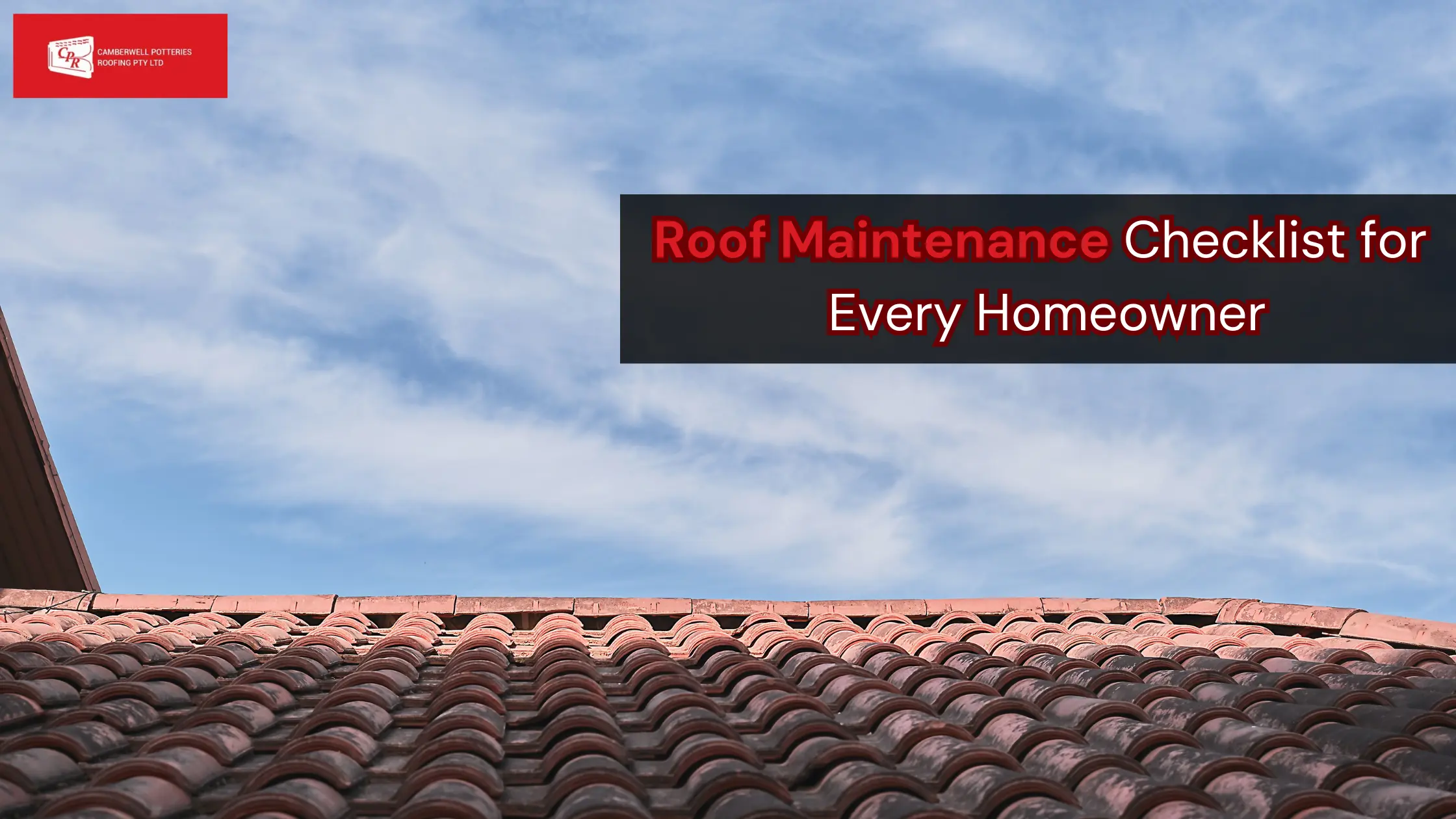 Image of a tiled roof with a blue sky and clouds in the background. A black rectangular banner with red text reads, "Roof Maintenance Checklist for Every Homeowner." The banner also features a logo with a house icon and the words "Your Local Roofing Experts.